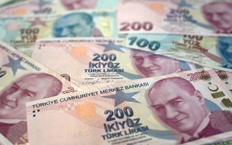 A picture taken on December 7, 2021 in Istanbul shows Turkish lira banknotes. - Turkey's annual inflation rate jumped over 20 percent in November, official data showed  on December 3, 2021, after a currency crisis last month in which the Turkish lira hit record lows against the dollar. (Photo by Ozan KOSE / AFP) (Photo by OZAN KOSE/AFP via Getty Images)