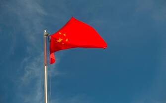 China flag in front of a blue sky