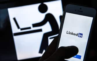 ST PETERSBURG, RUSSIA - OCTOBER 26, 2016: Pictured in this image is a mobile phone screen showing the logo of LinkedIn, a business-oriented social network purchased by Microsoft in 2015. Roskomnadzor, a Russian government agency regulating the internet and telecommunications, filed a lawsuit against LinkedIn on 25 October, 2016, claiming the social network should be banned for violating Russia's personal data legislation. Moscow's Tagansky District Court has ruled in favour of Roskomnadzor. LinkedIn has appealed the ruling, the appeal is to be considered by Moscow City Court on 10 November, 2016. Sergei Konkov/TASS