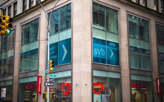 A sign in the window directs customers to the second floor offices of the Silicon Valley Bank in New York on Saturday, March 11, 2022. SVB collapsed on Friday, the largest bank failure since 2008â€™s Washington Mutual. (ÂPhoto by Richard B. Levine)