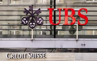 epa10530372 Logos of the Swiss banks Credit Suisse and UBS are seen on different buildings in Zurich, Switzerland, 18 March 2023. Shares of Credit Suisse lost more than one-quarter of their value on 15 March 2023, hitting a record low after its biggest shareholder, the Saudi National Bank, told outlets that it would not inject more money into the ailing Swiss bank. Its shares recovered briefly on 16 March after Switzerland's central bank announced that it was to loan CS money but fears of turmoil in the global banking sector persist.  EPA/MICHAEL BUHOLZER