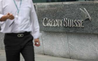 epa10536139 A man walks past the logo of Credit Suisse in Hong Kong, China, 22 March 2023. The Hong Kong Monetary Authority said Credit Suisse s assets in Hong Kong made up 0.5 percent of the banking system s total assets. Credit Suisse was purchased by rival UBS for over 3 billion US dollar after the collapse of the Switzerland-based investment bank.  EPA/JEROME FAVRE