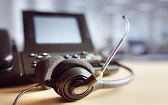 VOIP headset headphones and telephone concept for communication, it support, call center and customer service help desk