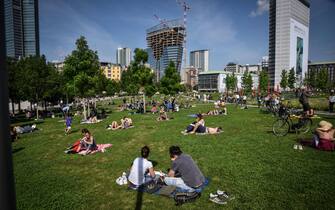 People at the Biblioteca degli Alberi park on the first Sunday after the lockdown, Milan, Italy 24 May 2020. Italy is gradually easing lockdown measures implemented to stem the spread of the SARS-CoV-2 coronavirus that causes the COVID-19 disease. ANSA/MATTEO CORNER