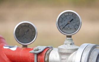 Measuring devices/  pressure gauges on a pipe
