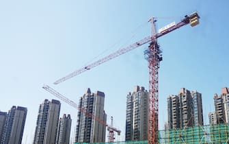 HANGZHOU, CHINA - AUGUST 18 2023: A view of a construction site of the heavily-indebted property giant Evergrande in Hangzhou city in east China's Zhejiang province. The developer has filed for bankruptcy protection in the US as the real estate crisis in China deepens.                      
