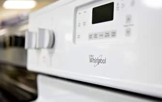 Whirlpool Corp. signage is displayed on a electric range stove at the Valley Appliance Sales store in Peru, Illinois, U.S., on Friday, July 20, 2018. Whirlpool Corp. is releasing earnings figures on July 23. Photographer: Daniel Acker/Bloomberg