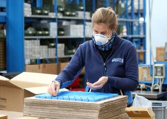 A worker of the Polini company at work wearing a protective mask, Alzano Lombardo, Bergamo, 06 March 2020. The factory is located in Alzano Lombardo one of the villages in the province of Bergamo which risks becoming "red zone" due to the spread of Coronavirus.. According to official figures the number of Coronavirus cases in Italy, the center of Europe's COVID-19 outbreak, was at 3,858 cases by 06 March with a death toll of 148 people while 414 people have recovered since the outbreak. ANSA/MATTEO BAZZI