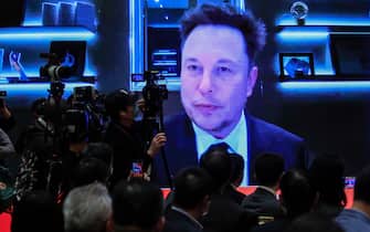 epa09084842 A video shows Elon Musk, CEO of Tesla Inc., speaking during the China Development Forum 2021 at the Diaoyutai State Guesthouse in Beijing, China, 20 March 2021. The China Development Forum 2021 is held in Beijing from 20 to 22 March 2021, with the theme of 'China On a New Journey of Modernisation.'  EPA/WU HONG