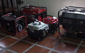 Portable generators are seen at a hardware store in the Horizonte neighborhood of Caracas, Venezuela, on Thursday, March 28, 2019. With the lights still flickering, Venezuelans are preparing for an event that the socialist regime has long tried to avoid: power rationing in the capital. Photographer: Carlos Becerra/Bloomberg