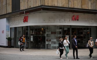 HAMBURG, GERMANY - JULY 03: A H&M sign store is seen on July 03, 2020 in Hamburg, Germany. (Photo by Jeremy Moeller/Getty Images)