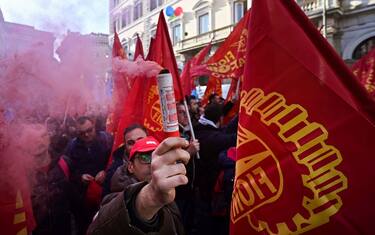 Workers from the FIOM metalworkers union join other workers and unions from all sectors coming from all over Italy, particularly from the South (Mezzogiorno) for a protest in downtown Rome on December 10, 2019, against the industrial crisis, the closure of factories, lay-offs and for public and private investment, best working conditions and social protection. - Italy is negotiating a new plan with the world's biggest steelmaker ArcelorMittal to save the Taranto steel plant that involves partial state ownership, the Italian Prime Minister said on December 9. (Photo by Vincenzo PINTO / AFP) (Photo by VINCENZO PINTO/AFP via Getty Images)