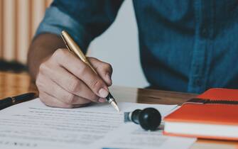 936711308 Customer signing contract for reantal or buy home - Real Estate Concept
