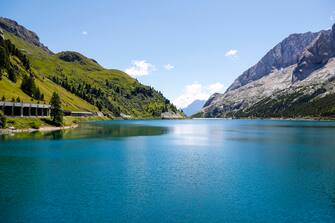 MARMOLADA , ITALY - JULY 18: Passo Fedaia with the lake Lago Fedaia in Val di Fassa in the Dolomite Alps on July 18, 2012 in Marmolada, Italy. The lake is at 2057 m altitude.Landscape and panoramic view. (Photo by EyesWideOpen/Getty Images)