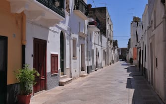 A view of a street in Bernalda, in the Italian region of Basilicata, on August 7, 2011. US film director Sofia Coppola will marry French rock singer Thomas Mars in August in her family's ancestral town of Bernalda in southern Italy, the town of the filmmaker's great grandfather, an Italian newspaper reported in May. The wedding will take place in Palazzo Margherita, the 19th-century villa that Coppola's legendary filmmaker father Francis Ford Coppola renovated in the town, transforming it into a luxury hotel, La Stampa daily reported without citing a source. AFP PHOTO / GIUSEPPE CACACE (Photo credit should read GIUSEPPE CACACE/AFP via Getty Images)