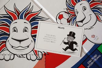 LONDON, ENGLAND - MARCH 29:  A 'Heats' card from a special edition London 2012 Olympic Games themed version of the Monopoly board game on March 29, 2012 in London, England.  (Photo by Oli Scarff/Getty Images)