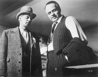 Actor Joseph Cotten (L) plays Jedediah Leland and Orson Welles (R) plays Charles Foster Kane in Welles' film Citizen Kane.