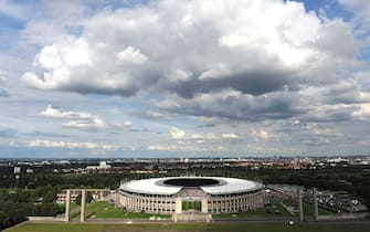 General exterior view of Berlin's Olympic stadium (Olympiastadion) taken as supporters arrive to attend the friendly football match Hertha Berlin vs Real Madrid on July 27, 2011. Real Madrid won 1-3.      AFP PHOTO / PATRIK STOLLARZ        (Photo credit should read PATRIK STOLLARZ/AFP via Getty Images)