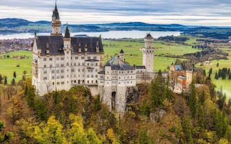 Famous Neuschwanstein castle view in autumn season, Bavaria, Germany