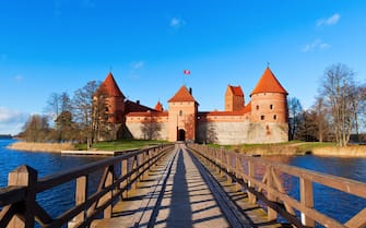 Lithuania, Trakai: front view from bridge across the lake to the castle