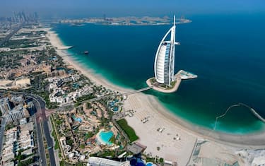 This picture taken on July 8, 2020 shows an aerial view of the Burj al-Arab hotel in the Gulf emirate of Dubai, during a government-organised helicopter tour. (Photo by KARIM SAHIB / AFP) (Photo by KARIM SAHIB/AFP via Getty Images)