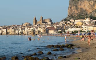CEFALU, ITALY : Tourists in coastal town of Cefalu with Baroque style architecture in Northern Sicily, Italy.  (Photo by Tim Graham/Getty Images)