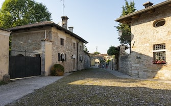 Strassoldo, Italy. September 11, 2020.  panoramic view of the houses in the medieval rural village of Strassoldo