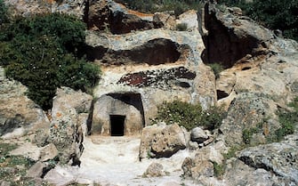 601445853 ITALY - SEPTEMBER 27: Domus de Janas, Necropolis of Montessu, Villaperuccio, Sardinia, Italy. Prenuragic period, 3rd millennium BC. (Photo by DeAgostini/Getty Images)