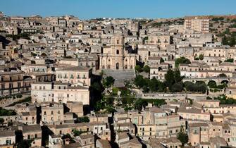 824951498 A picture taken on July 31, 2017 shows the Cathedral of San Giorgio (C), in Modica, Sicily. - Modica is part of the Italy's UNESCO Heritage Sites. (Photo by ludovic MARIN / AFP) (Photo credit should read LUDOVIC MARIN/AFP via Getty Images)