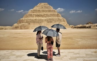 14 September 2021, Egypt, Giza: Tourists visit the Step Pyramid of Djoser in Saqqara necropolis. Photo: Sayed Hassan/dpa (Photo by Sayed Hassan/picture alliance via Getty Images)