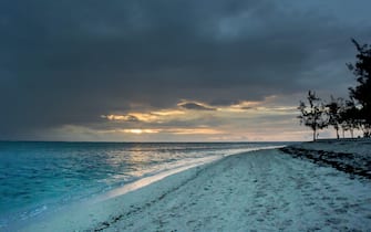 18 November 2017, Mauritius, Le Morne: The beach at sunset on the southwest coast of the island Mauritius in the Indian Ocean. Photo: Holger Hollemann/dpa