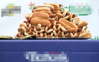 A tray of 75 hot dogs on display at the Nathan’s Famous Fourth of July International Hot Dog-Eating Contest weight-in ceremony held at The Vessel, in Hudson Yards, New York, NY, July 2, 2021. (Photo by Anthony Behar/Sipa USA)