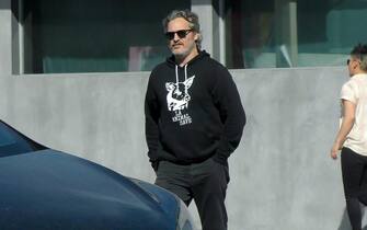 Los Angeles, CA  - **  - Joaquin Phoenix hugs his friend Moby as he says goodbye exiting Crossroads Cafe after enjoying lunch. The actor sports an 'LA Animal Save' black hoodie supporting veganism.

Pictured: Joaquin Phoenix

BACKGRID USA 28 FEBRUARY 2020 

USA: +1 310 798 9111 / usasales@backgrid.com

UK: +44 208 344 2007 / uksales@backgrid.com

*UK Clients - Pictures Containing Children
Please Pixelate Face Prior To Publication*