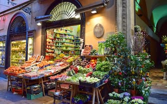 Bologna, Italy - November 2, 2016: The famous market called "Mercato delle erbe" in the city center offer a large variety of fresh fruits and vegetables for the people