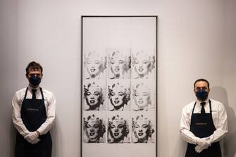 TOPSHOT - Andy Warhol's "Nine Marylins", which sold for $47,373,000, is displayed during an auction of The Macklowe Collection, at Sotheby's on November 15, 2021 in New York City. - RESTRICTED TO EDITORIAL USE - MANDATORY MENTION OF THE ARTIST UPON PUBLICATION - TO ILLUSTRATE THE EVENT AS SPECIFIED IN THE CAPTION (Photo by Yuki IWAMURA / AFP) / RESTRICTED TO EDITORIAL USE - MANDATORY MENTION OF THE ARTIST UPON PUBLICATION - TO ILLUSTRATE THE EVENT AS SPECIFIED IN THE CAPTION / RESTRICTED TO EDITORIAL USE - MANDATORY MENTION OF THE ARTIST UPON PUBLICATION - TO ILLUSTRATE THE EVENT AS SPECIFIED IN THE CAPTION (Photo by YUKI IWAMURA/AFP via Getty Images)
