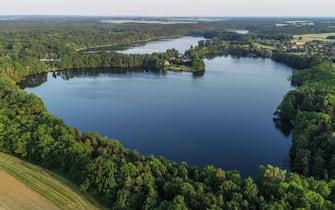 28 May 2018,Â Germany, Falkenhagen: The Burgsee (Castle Lake) of Falkenhagen has the shape of a heart when seen from the air (taken with drone). Photo: Patrick Pleul/dpa-Zentralbild/dpa (Photo by Patrick Pleul/picture alliance via Getty Images)