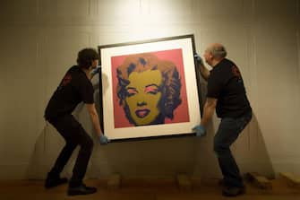 A silk screen print of Marilyn Monroe by Andy Warhol is hung at the Dulwich Picture Gallery ahead of a major new exhibition of the US artist's work.   (Photo by Ian Nicholson/PA Images via Getty Images)
