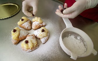 Preparation of Sfogliatella dessert, Naples, Campania, Italy. (Photo by: Alfio Giannotti/REDA&CO/Universal Images Group via Getty Images)