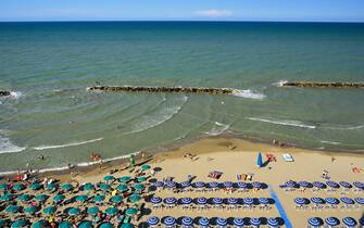 View from above on a resting people on the Adriatic coastline with the beaches in Montesilvano Pescara, Abruzzo region