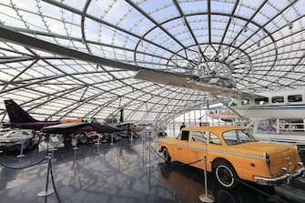This general view shows Red Bull's "Hangar 7" housing a collection of racing cars, motorbikes and historic aircrafts of the Flying Bulls aerobatic team in Salzburg on January 15, 2014. The building was designed by Austrian architect Volkmar Burgstaller. AFP PHOTO / ALEXANDER KLEIN  --- MANDATORY MENTION OF THE ORGANIZER RESTRICTED TO EDITORIAL USE TO ILLUSTRATE THE EVENT AS SPECIFIED IN THE CAPTION---        (Photo credit should read ALEXANDER KLEIN/AFP via Getty Images)