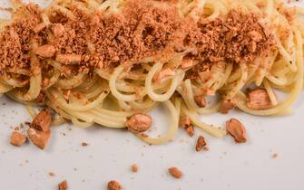Spaghetti with chestnut honey, bottarga of ricciola and fried Avola almond