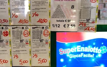 Photo shows SuperEnalotto lottery tickets in a shop in central Rome on August 6, 2009. Italy's lottery prize has risen to a record-breaking 119 million euros (171 million dollars) since no ticket holder claimed the winning numbers. No-one in the country has had the six winning numbers in the SuperEnalotto game since January, which has caused this year's prize to break Italian records. The lottery has also attracted interest from neighbouring countries and visitors have reportedly come to Italy to place their bets in the hope of choosing the right six numbers.  AFP PHOTO / Vincenzo Pinto (Photo credit should read VINCENZO PINTO/AFP via Getty Images)
