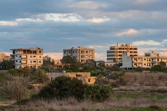FAMAGUSTA, CYPRUS - JANUARY 05:  Nature covers the abandoned houses of the Varosha quarter on January 5, 2017 in Famagusta, Cyprus. Prior to the Turkish invasion of Cyprus in 1974, the abandoned quarter of Varosha was the modern tourist area of the city, and one of the most important tourist destinations in the world.  (Photo by Awakening/Getty Images)