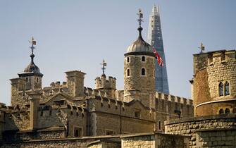 581720403 A view of the Tower of London with the top of The Shard behind it, London, 10th September 2015. (Photo by Kypros/Getty Images)