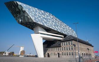 The Port Authority Building, designed byÂ Zaha Hadid Architects, at the newly merged Port of Antwerp-Bruges in Antwerp, Belgium, on Thursday, April 28, 2022. The port, officially unified today from the ports of Antwerp and Zeebrugge, is Europe's largest export port, throughput port for vehicles and integrated chemical cluster as well as one of the region's leading container ports, according to the port's website. Photographer: Nathan Laine/Bloomberg via Getty Images
