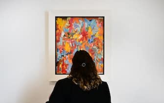 A woman views 'Small False Start' by Jasper Johns on display at Christie's Los Angeles on October 12, 2022 in Beverly Hills, California during the media preview of "Visionary: The Paul Allen Collection." - A $1 billion art auction, the most expensive collection ever to go under the hammer, was unveiled in Los Angeles today. 
The collection of more than 150 pieces features artwork from Vincent Van Gogh, Claude Monet, Paul Gauguin, and Jasper Johns among others. 
The auction will be held by Christie's and will take place in New York on November 9 and 10th. All revenue will be used for charity.
 - RESTRICTED TO EDITORIAL USE - MANDATORY MENTION OF THE ARTIST UPON PUBLICATION - TO ILLUSTRATE THE EVENT AS SPECIFIED IN THE CAPTION (Photo by Frederic J. BROWN / AFP) / RESTRICTED TO EDITORIAL USE - MANDATORY MENTION OF THE ARTIST UPON PUBLICATION - TO ILLUSTRATE THE EVENT AS SPECIFIED IN THE CAPTION / RESTRICTED TO EDITORIAL USE - MANDATORY MENTION OF THE ARTIST UPON PUBLICATION - TO ILLUSTRATE THE EVENT AS SPECIFIED IN THE CAPTION (Photo by FREDERIC J. BROWN/AFP via Getty Images)