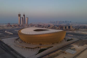 DOHA, QATAR - JUNE 19: (EDITORS NOTE: This photograph was taken using a drone) An aerial view of Lusail Stadium at sunset on June 19, 2022 in Doha, Qatar. The 80,000-seat stadium, designed by Foster + Partners studio, will host the final game of the FIFA World Cup Qatar 2022 starting in November. (Photo by David Ramos/Getty Images)