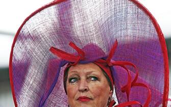 A dressed up visitor attends the Easter Parade in the Keukenhof, the world's largest bulb garden, in Lisse on Easter Monday on April 5, 2010. During this annual show members of the public are invited to show their own (home made) hats. AFP PHOTO / ANP ROBIN UTRECHT netherlands out - belgium out (Photo credit should read ROBIN UTRECHT/AFP via Getty Images)