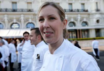 British chef Clare Smyth poses among 240 chefs from 25 countries, representing five continents and 300 stars ranked in the Michelin gastronomy guide, as part of the 25th anniversary of French chef Alain Ducasse's restaurant Le Louis XV, on November 17, 2012 in Monaco.  AFP PHOTO / VALERY HACHE (Photo by Valery HACHE / AFP) (Photo by VALERY HACHE/AFP via Getty Images)