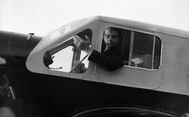 FRANCE - 1936: Portrait of Antoine de Saint-Exupery, aviator and writer, in the cockpit of his airplane, the Caudron Simoun, 1936 in France. (Photo by Keystone-France/Gamma-Rapho via Getty Images)